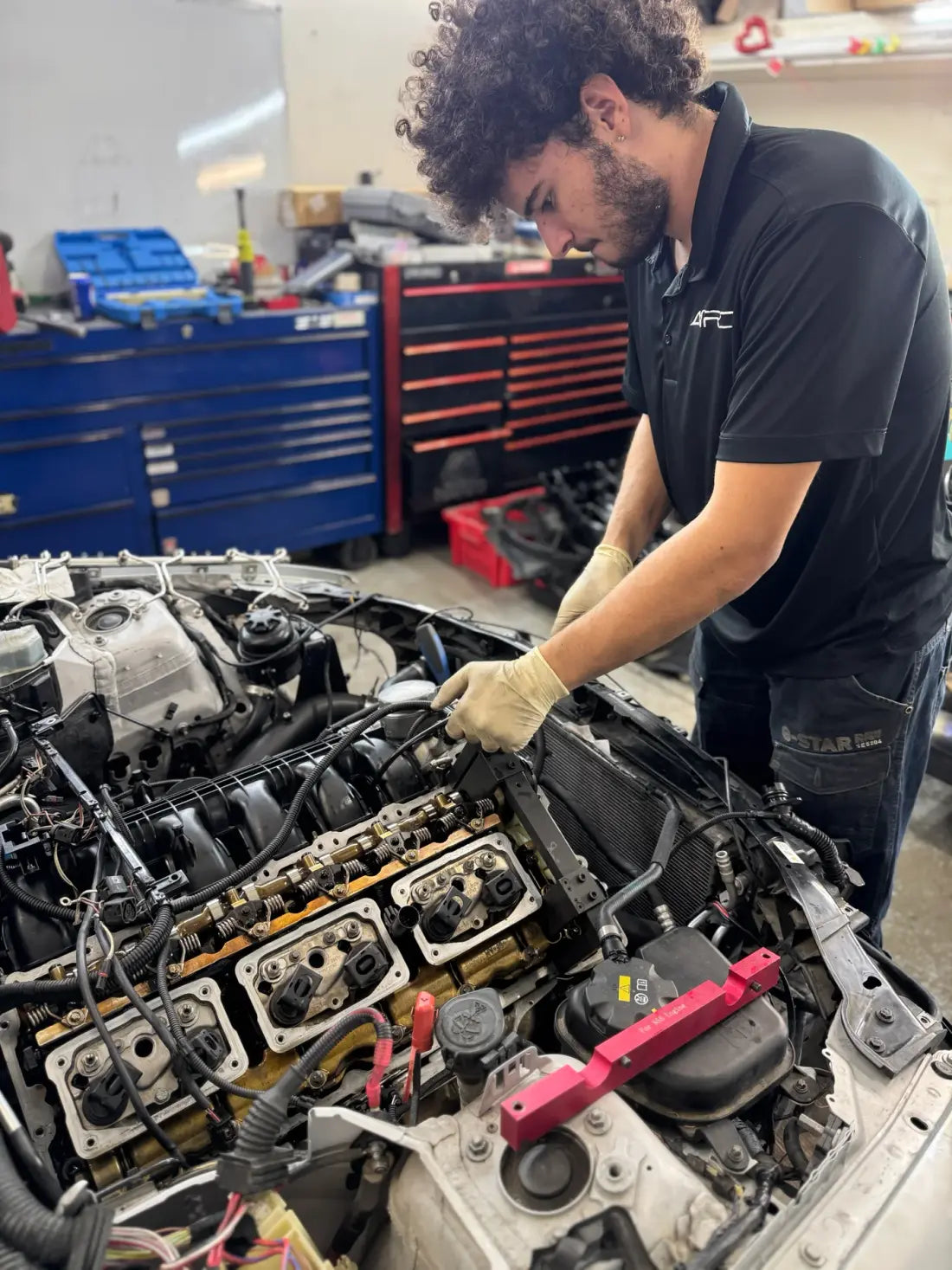 AYRD technician working on an engine
